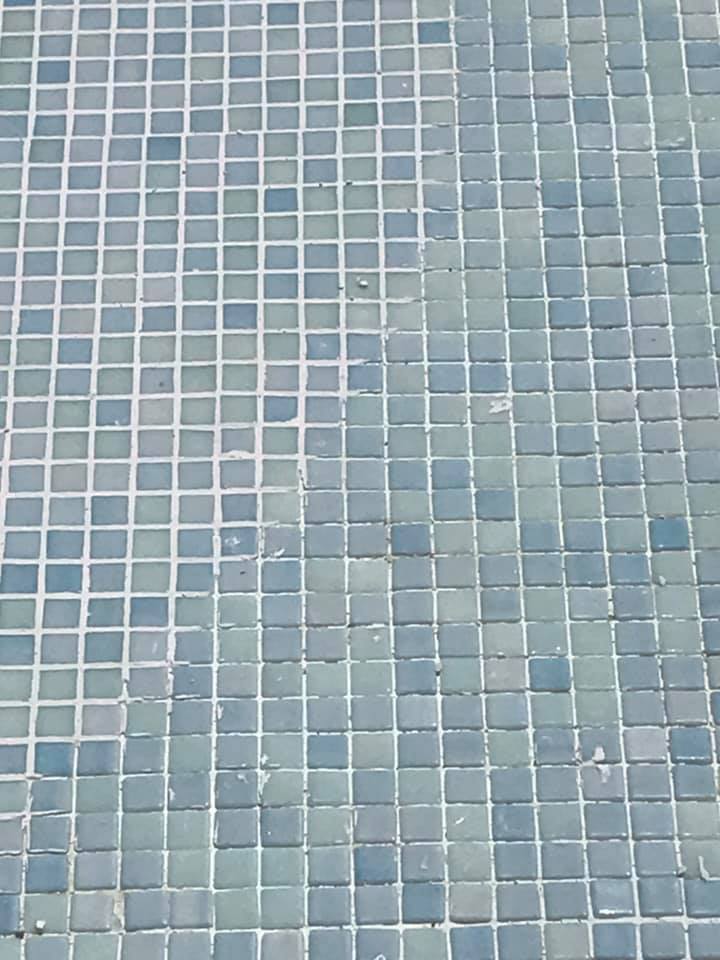 Re-grout and tiling needed